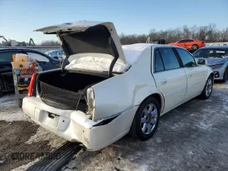 2007 Cadillac DTS Luxury I z VIN 1G6KD57Y57U223002, wystawiony jako Copart lot #87247984 z przebiegiem Nie podano mil oraz Szkoda całkowita • Salvage title. Historia ofert i sprzedaży dostępna na DreamBid. Obrazek 3.