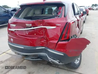 2020 Cadillac XT5 Premium Luxury FWD z VIN 1GYKNCRS8LZ228516, wystawiony jako IAAI lot #42409513 z przebiegiem 54 765 mil mil oraz . Historia ofert i sprzedaży dostępna na DreamBid. Obrazek 17.