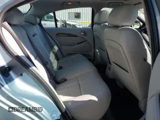 2003 Jaguar S-Type z VIN SAJEA01U53HM73131, wystawiony jako Copart lot #73430914 z przebiegiem 72 730 mil mil oraz Szkody całkowita. Historia ofert i sprzedaży dostępna na DreamBid. Obrazek 10.