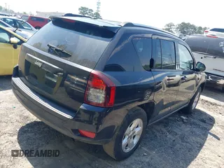 2014 Jeep Compass Sport with VIN 1C4NJCBA0ED511217, listed as a IAAI auction lot 42008976 with 210,780 mi miles. Bid and sale history available at carsss.com. Image 4.