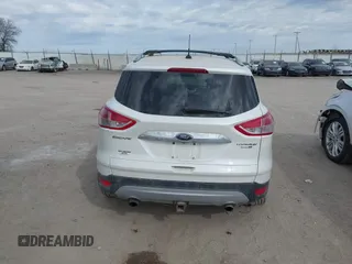 2015 Ford Escape Titanium with VIN 1FMCU9J90FUA67262, listed as a IAAI auction lot 41869583 with 161,281 mi miles. Bid and sale history available at carsss.com. Image 17.