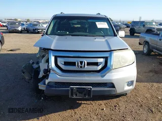 2011 Honda Pilot EX with VIN 5FNYF3H41BB018182, listed as a IAAI auction lot 42000601 with 152,912 mi miles and . Bid and sale history available at carsss.com. Image 13.