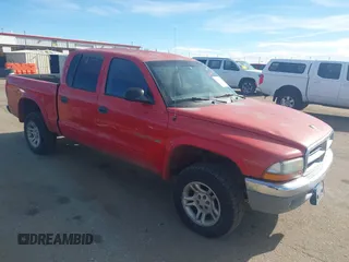 2002 Dodge Dakota SLT with VIN 1B7HG48N32S518455, listed as a IAAI auction lot 41652316 with 234,856 mi miles. Bid and sale history available at carsss.com. Image 1.