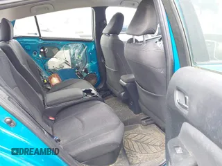 2017 Toyota Prius Plus z VIN JTDKARFP0H3016014, wystawiony jako IAAI lot #41797703 z przebiegiem 80 657 mil mil oraz . Historia ofert i sprzedaży dostępna na DreamBid. Obrazek 8.