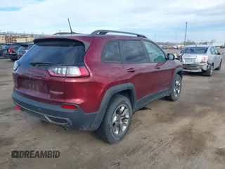 2019 Jeep Cherokee Trailhawk Elite with VIN 1C4PJMBX6KD378848, listed as a IAAI auction lot 40754408 with 52,901 mi miles. Bid and sale history available at carsss.com. Image 4.