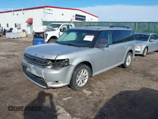 2016 Ford Flex SE z VIN 2FMGK5B8XGBA23900, wystawiony jako IAAI lot #41599714 z przebiegiem 102 961 mil mil oraz . Historia ofert i sprzedaży dostępna na DreamBid. Obrazek 18.