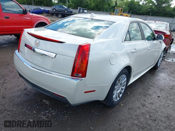 2012 Cadillac CTS Luxury with VIN 1G6DG5E57C0137409, listed as a IAAI auction lot 42633890 with 86,886 mi miles and . Bid and sale history available at DreamBid. Image 4.