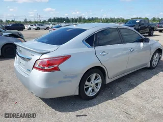2013 Nissan Altima 2.5 SL with VIN 1N4AL3AP0DC143100, listed as a IAAI auction lot 41998585 with 102,564 mi miles. Bid and sale history available at carsss.com. Image 4.