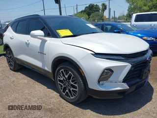 2024 Chevrolet Blazer RS z VIN 3GNKBERS5RS180321, wystawiony jako IAAI lot #42259552 z przebiegiem 21 356 mil mil oraz . Historia ofert i sprzedaży dostępna na DreamBid. Obrazek 1.