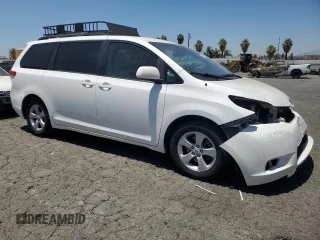 2012 Toyota Sienna LE AAS with VIN 5TDKK3DC4CS217089, listed as a Copart auction lot 64078095 with 266,382 mi miles and Salvage title. Bid and sale history available at DreamBid. Image 4.