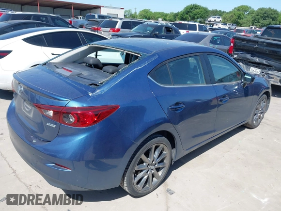 2018 Mazda 3 Touring with VIN 3MZBN1V38JM206827, listed as a IAAI auction lot 41983631 with 51,303 mi miles and . Bid and sale history available at DreamBid. Image 4.