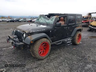 2018 Jeep Wrangler JK Unlimited Rubicon Recon with VIN 1C4BJWFG9JL844051, listed as a IAAI auction lot 40923174 with 64,309 mi miles. Bid and sale history available at carsss.com. Image 2.