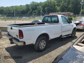 2000 Ford F-150 XL с VIN 1FTPF18L2YNA18807, выставлен на аукционе Copart как лот 62648305 с пробегом Не указан миль и Списание • Salvage title. История ставок и продаж доступна на DreamBid. Изображение 3.