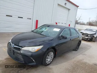 2015 Toyota Camry LE with VIN 4T1BD1FK6FU157623, listed as a IAAI auction lot 42015005 with 300,974 mi miles and . Bid and sale history available at DreamBid. Image 2.