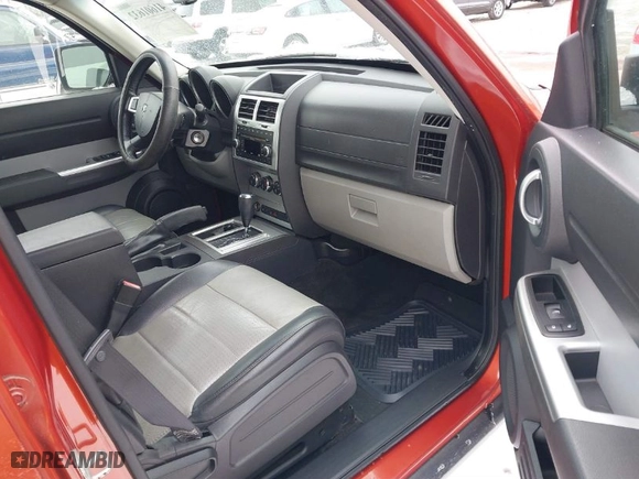 2007 Dodge Nitro SLT with VIN 1D8GU58K67W729201, listed as a IAAI auction lot 41601632 with 167,432 mi miles. Bid and sale history available at carsss.com. Image 5.