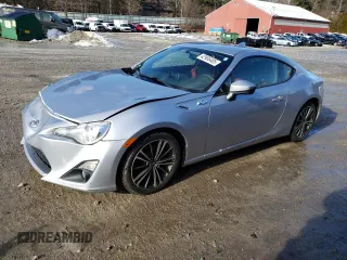2015 Scion FR-S with VIN JF1ZNAA13F9702507, listed as a Copart auction lot 42906405 with 96,903 mi miles and Salvage Title. Bid and sale history available at carsss.com. Image 1.