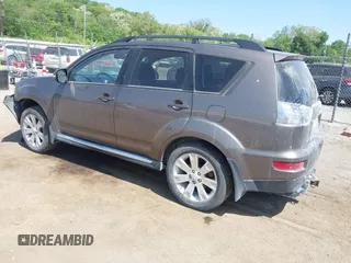 2011 Mitsubishi Outlander SE with VIN JA4AS3AW0BU032083, listed as a IAAI auction lot 42257699 with 160,038 mi miles and . Bid and sale history available at DreamBid. Image 3.