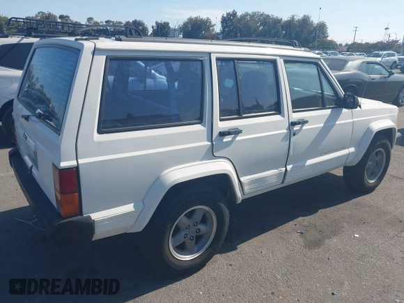 1996 Jeep Cherokee Sport with VIN 1J4FT68S7TL265733, listed as a IAAI auction lot 42499228 with 230,001 mi miles and . Bid and sale history available at DreamBid. Image 4.