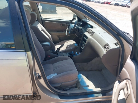 1997 Toyota Camry LE with VIN JT2BG22K4V0084080, listed as a IAAI auction lot 42566043 with 167,774 mi miles and . Bid and sale history available at DreamBid. Image 5.