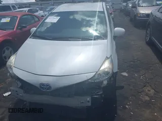 2015 Toyota Prius Two with VIN JTDZN3EU8FJ036043, listed as a IAAI auction lot 42176629 with 154,939 mi miles and . Bid and sale history available at DreamBid. Image 12.