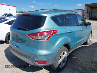 2013 Ford Escape SE with VIN 1FMCU0GX6DUA85991, listed as a IAAI auction lot 42222248 with 136,457 mi miles and . Bid and sale history available at DreamBid. Image 4.