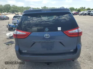 2015 Toyota Sienna LE with VIN 5TDJK3DC4FS107711, listed as a Copart auction lot 57693005 with 141,370 mi miles and Salvage title. Bid and sale history available at DreamBid. Image 6.