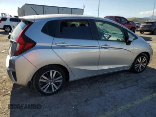 2015 Honda Fit EX-L z VIN 3HGGK5H8XFM766048, wystawiony jako Copart lot #56436135 z przebiegiem 67 587 mil mil oraz Szkoda całkowita • Salvage title. Historia ofert i sprzedaży dostępna na DreamBid. Obrazek 3.