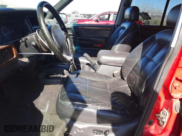 1996 Jeep Grand Cherokee Limited with VIN 1J4GZ78Y0TC376265, listed as a Copart auction lot 52124345 with 205,676 mi miles and Salvage Title. Bid and sale history available at carsss.com. Image 7.