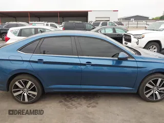 2020 Volkswagen Jetta S z VIN 3VWN57BU4LM048390, wystawiony jako IAAI lot #41946185 z przebiegiem 94 140 mil mil oraz . Historia ofert i sprzedaży dostępna na DreamBid. Obrazek 13.