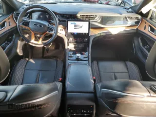 2023 Jeep Grand Cherokee Summit with VIN 1C4RJHEGXP8722063, listed as a Copart auction lot 86552894 with 38,463 mi miles and Salvage title. Bid and sale history available at DreamBid. Image 8.