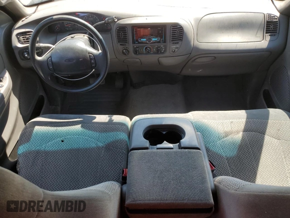 2000 Ford F-150 XL with VIN 2FTRX18L2YCA62429, listed as a Copart auction lot 56033895 with 180,156 mi miles and Non repairable. Bid and sale history available at DreamBid. Image 8.