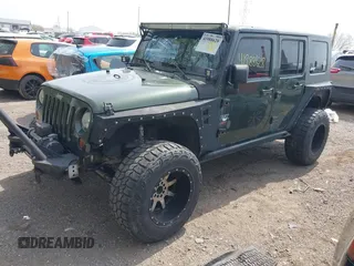 2007 Jeep Wrangler Unlimited X with VIN 1J4GA39147L101084, listed as a IAAI auction lot 41988628 with 194,562 mi miles and . Bid and sale history available at DreamBid. Image 17.