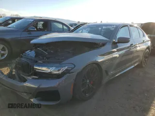 2022 BMW 5 Series M550i xDrive z VIN WBA13BK06NCJ48418, wystawiony jako Copart lot #75822653 z przebiegiem Nie podano mil oraz . Historia ofert i sprzedaży dostępna na DreamBid. Obrazek 1.