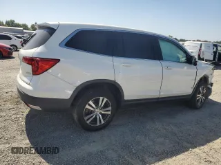 2018 Honda Pilot EX-L with VIN 5FNYF6H54JB013986, listed as a Copart auction lot 60743165 with 124,373 mi miles and Salvage title. Bid and sale history available at DreamBid. Image 3.