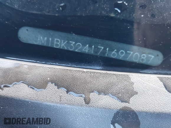 2007 Mazda 3 S Touring with VIN JM1BK324171697087, listed as a IAAI auction lot 41878840 with 171,102 mi miles and . Bid and sale history available at DreamBid. Image 12.