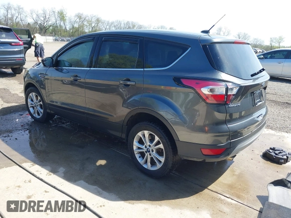 2017 Ford Escape SE with VIN 1FMCU0GD6HUE52948, listed as a IAAI auction lot 41981065 with 63,971 mi miles and . Bid and sale history available at DreamBid. Image 3.