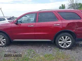 2013 Dodge Durango Crew with VIN 1C4RDJDGXDC614275, listed as a IAAI auction lot 42595022 with 171,260 mi miles and . Bid and sale history available at DreamBid. Image 14.