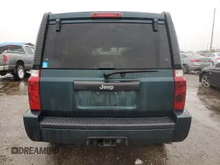 2006 Jeep Commander with VIN 1J8HH48NX6C125803, listed as a Copart auction lot 71247304 with 214,297 mi miles and Salvage Title. Bid and sale history available at carsss.com. Image 6.