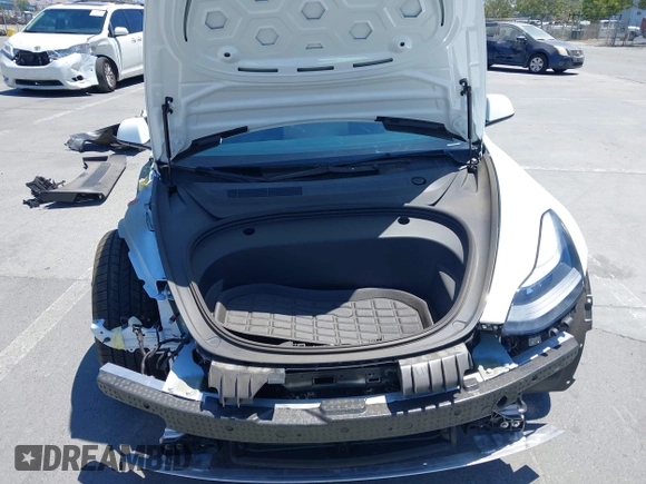 2023 Tesla Model 3 z VIN 5YJ3E1EA4PF454754, wystawiony jako IAAI lot #42665785 z przebiegiem 5 218 mil mil oraz . Historia ofert i sprzedaży dostępna na DreamBid. Obrazek 10.