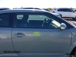 2015 Scion tC with VIN JTKJF5C7XFJ012872, listed as a IAAI auction lot 42128621 with 100,832 mi miles. Bid and sale history available at carsss.com. Image 14.