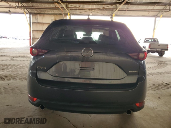 2020 Mazda CX-5 Touring with VIN JM3KFACM6L0804410, listed as a Copart auction lot 51009465 with 55,498 mi miles and Salvage Title. Bid and sale history available at carsss.com. Image 6.