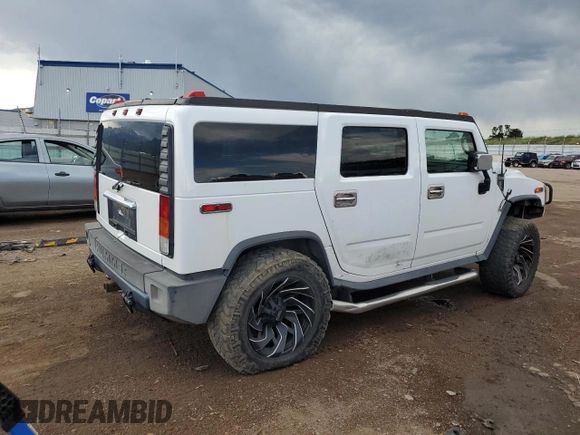 2004 Hummer H2 z VIN 5GRGN23U94H109105, wystawiony jako Copart lot #60548255 z przebiegiem 218 770 mil mil oraz Czysty tytuł • Clean title. Historia ofert i sprzedaży dostępna na DreamBid. Obrazek 3.