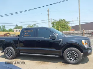 2023 Ford F-150 XL z VIN 1FTEW1EP6PKF23103, wystawiony jako IAAI lot #42390868 z przebiegiem 15 149 mil mil oraz . Historia ofert i sprzedaży dostępna na DreamBid. Obrazek 14.