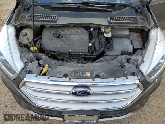 2017 Ford Escape SE z VIN 1FMCU0GD5HUA67154, wystawiony jako Copart lot #58474105 z przebiegiem 129 896 mil mil oraz Czysty tytuł • Clean title. Historia ofert i sprzedaży dostępna na DreamBid. Obrazek 12.