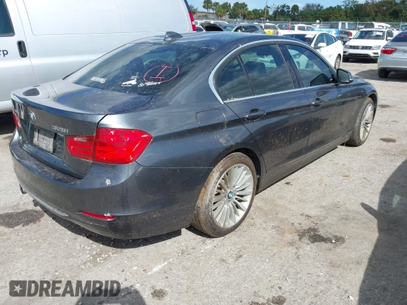 2013 BMW 3 Series 328i xDrive with VIN WBA3B3G56DNR81144, listed as a IAAI auction lot 40620694 with 159,022 mi miles. Bid and sale history available at carsss.com. Image 4.
