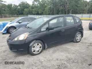 2009 Honda Fit with VIN JHMGE88249S068080, listed as a Copart auction lot 52469735 with 222,156 mi miles and Clean Title. Bid and sale history available at carsss.com. Image 1.