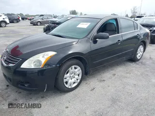 2012 Nissan Altima 2.5 SL with VIN 1N4AL2AP1CN488939, listed as a IAAI auction lot 42011687 with 146,962 mi miles. Bid and sale history available at carsss.com. Image 2.
