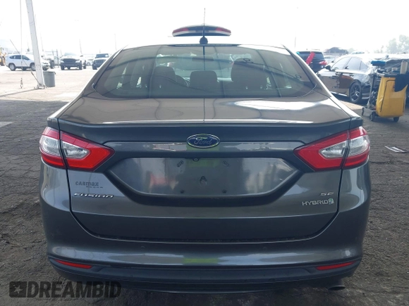 2015 Ford Fusion SE Hybrid with VIN 3FA6P0LU6FR309099, listed as a IAAI auction lot 42497429 with 157,631 mi miles and . Bid and sale history available at DreamBid. Image 16.