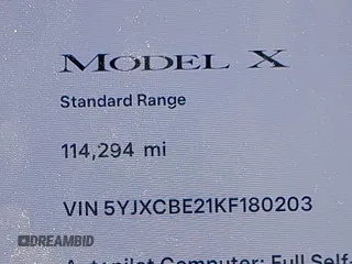2019 Tesla Model X 75D with VIN 5YJXCBE21KF180203, listed as a IAAI auction lot 42190255 with 114,294 mi miles and . Bid and sale history available at carsss.com. Image 15.