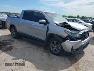2021 Honda Ridgeline RTL-E with VIN 5FPYK3F70MB025806, listed as a IAAI auction lot 42311667 with 30,143 mi miles and . Bid and sale history available at DreamBid. Image 1.